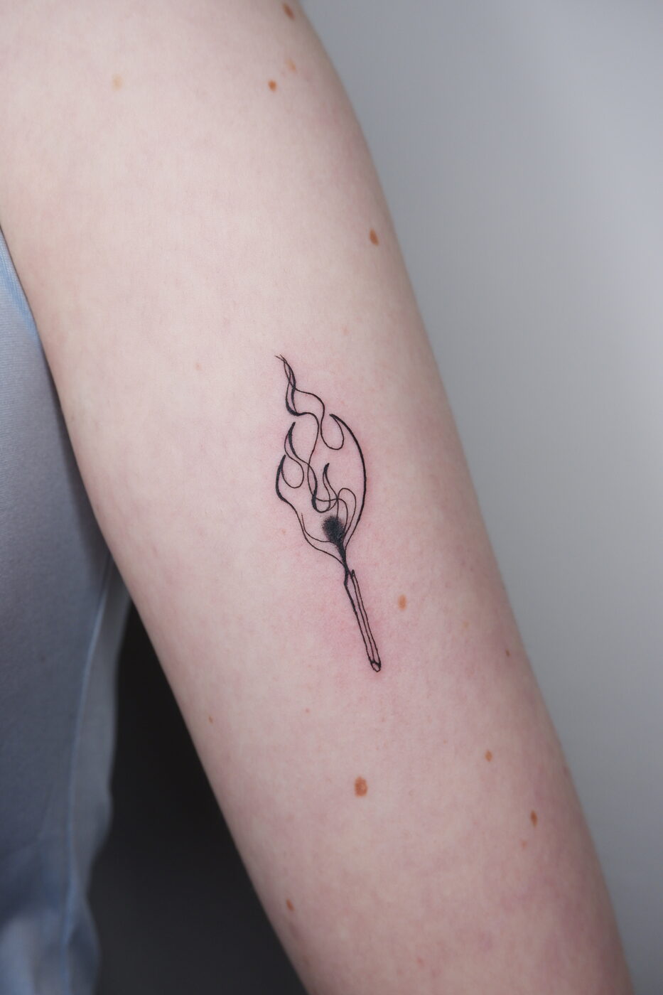 ornament tattoos on lower back