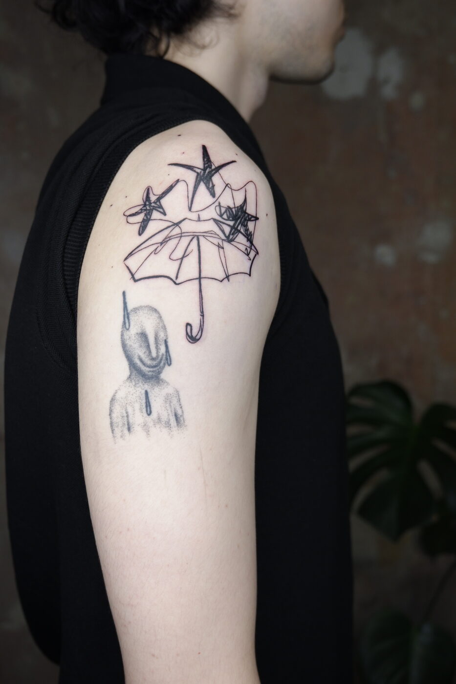 cat in hand tattoo