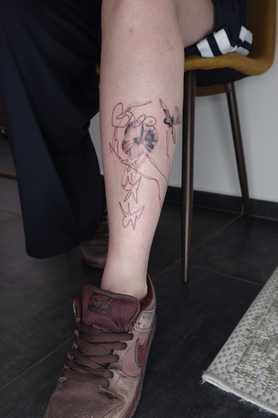 leg linework piece tattoo